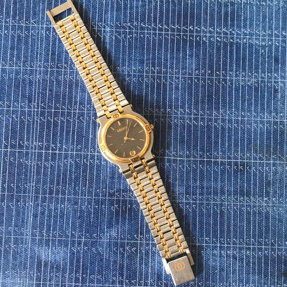 Gucci 9000M gold and silver bracelet watch